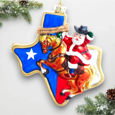 Personalized Glass Texas Santa Christmas Ornament featuring a cowboy Santa on horseback with the Texas state flag design.
Personalized Glass Texas Santa Christmas Ornament featuring a cowboy Santa on horseback with the Texas state flag design.
