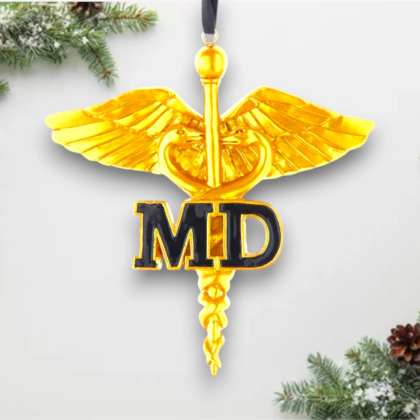 Personalized Gold Caduceus Doctor MD Christmas Ornament featuring the gold caduceus symbol with bold black "MD" letters, customizable with name and year.

