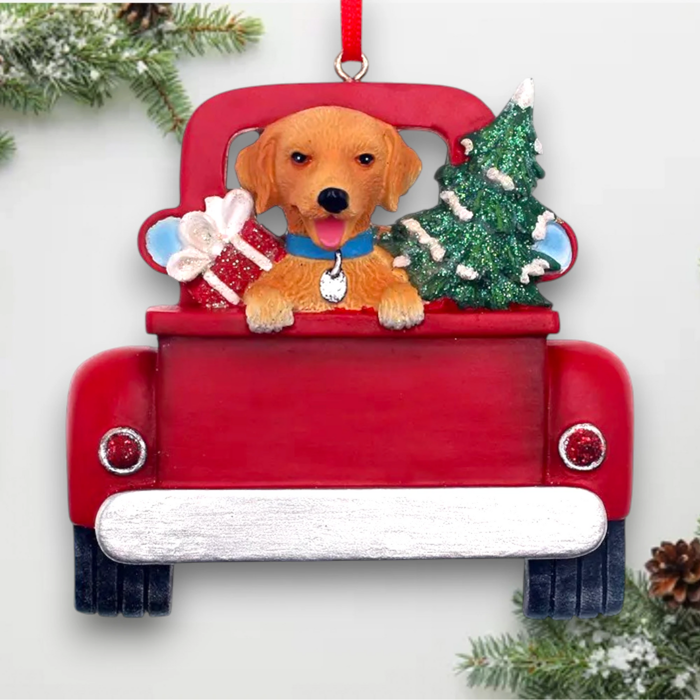 Personalized Golden Retriever In Back Of Truck Christmas Ornament featuring a Golden Retriever, Christmas tree, and holiday gifts in a red truck with customizable name and year.