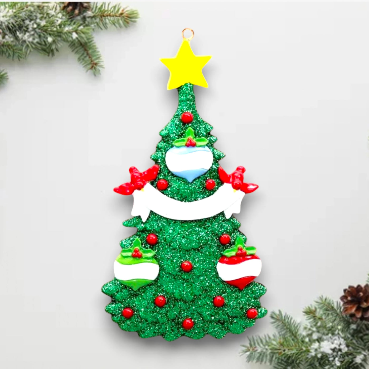 Personalized Green Christmas Tree Ornament with 3 customizable baubles, red accents, and a yellow star topper, perfect for families and holiday celebrations.

