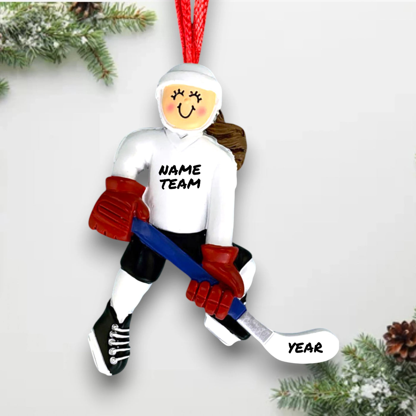 Personalized Female Brunette Hockey Player Ornament with Custom Name, Team, and Year – White Uniform with Blue Stick Christmas Ornament.

