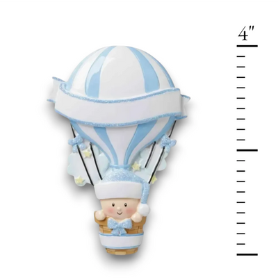 Personalized Hot Air Balloon Blue Baby’s First Christmas Ornament featuring a blue and white striped balloon with baby in basket, customizable with name and year.