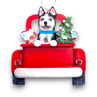 Personalized Husky In Back Of Truck Christmas Ornament featuring a Husky, a festive red truck, a Christmas tree, and a gift, customizable with name and year.

