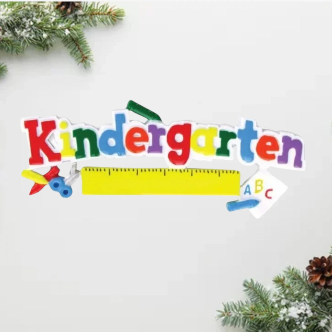 Personalized Kindergarten Christmas Ornament with colorful letters, crayons, ruler, and ABC details.