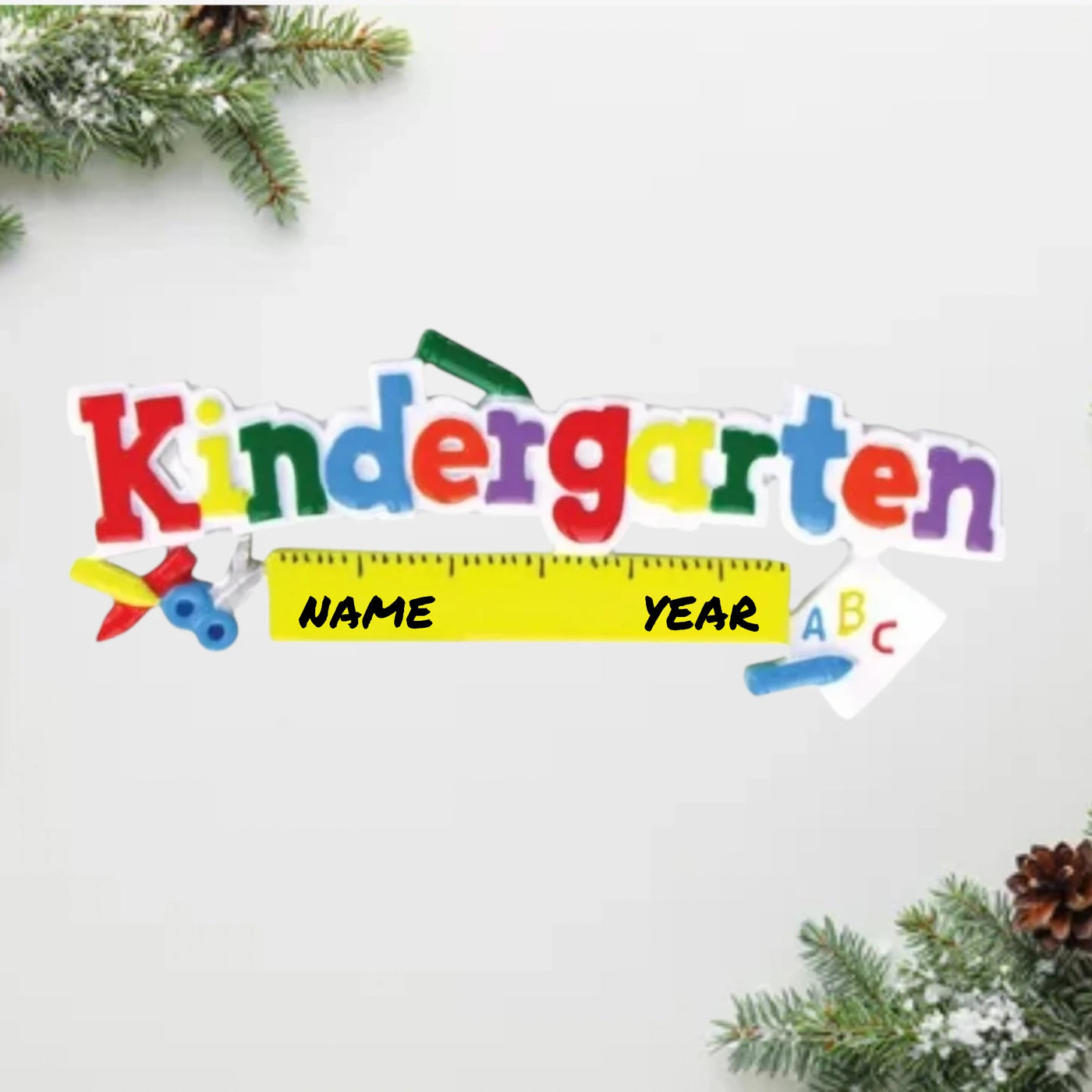 Personalized Kindergarten Christmas Ornament with colorful letters, crayons, ruler, and ABC details.