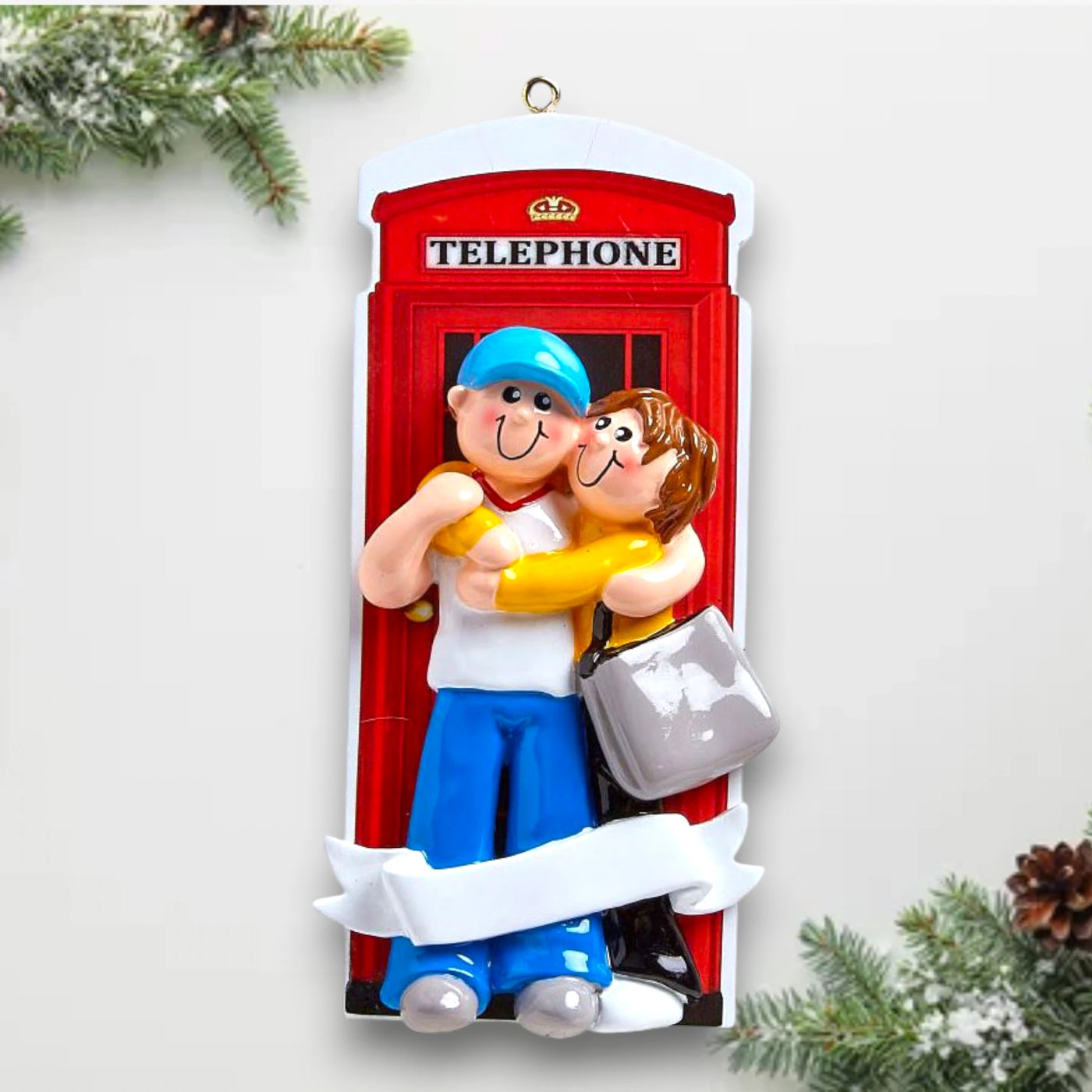 Personalized LOVE IN LONDON Christmas Ornament featuring a couple, a red telephone booth, and customizable names and year.