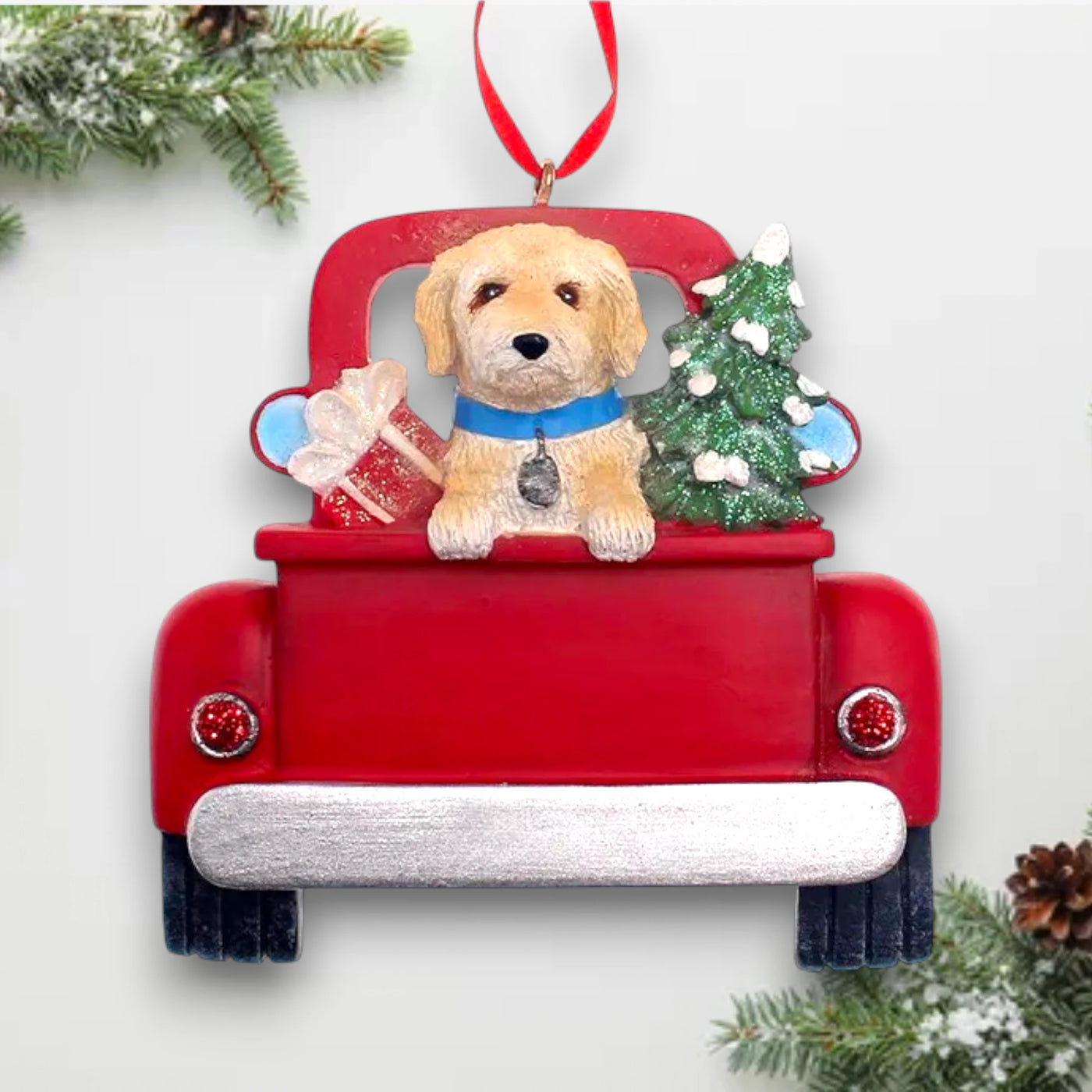 Personalized Labradoodle In Back Of Truck Christmas Ornament featuring a Labradoodle, a Christmas tree, and gifts in a red truck with customizable name and year.