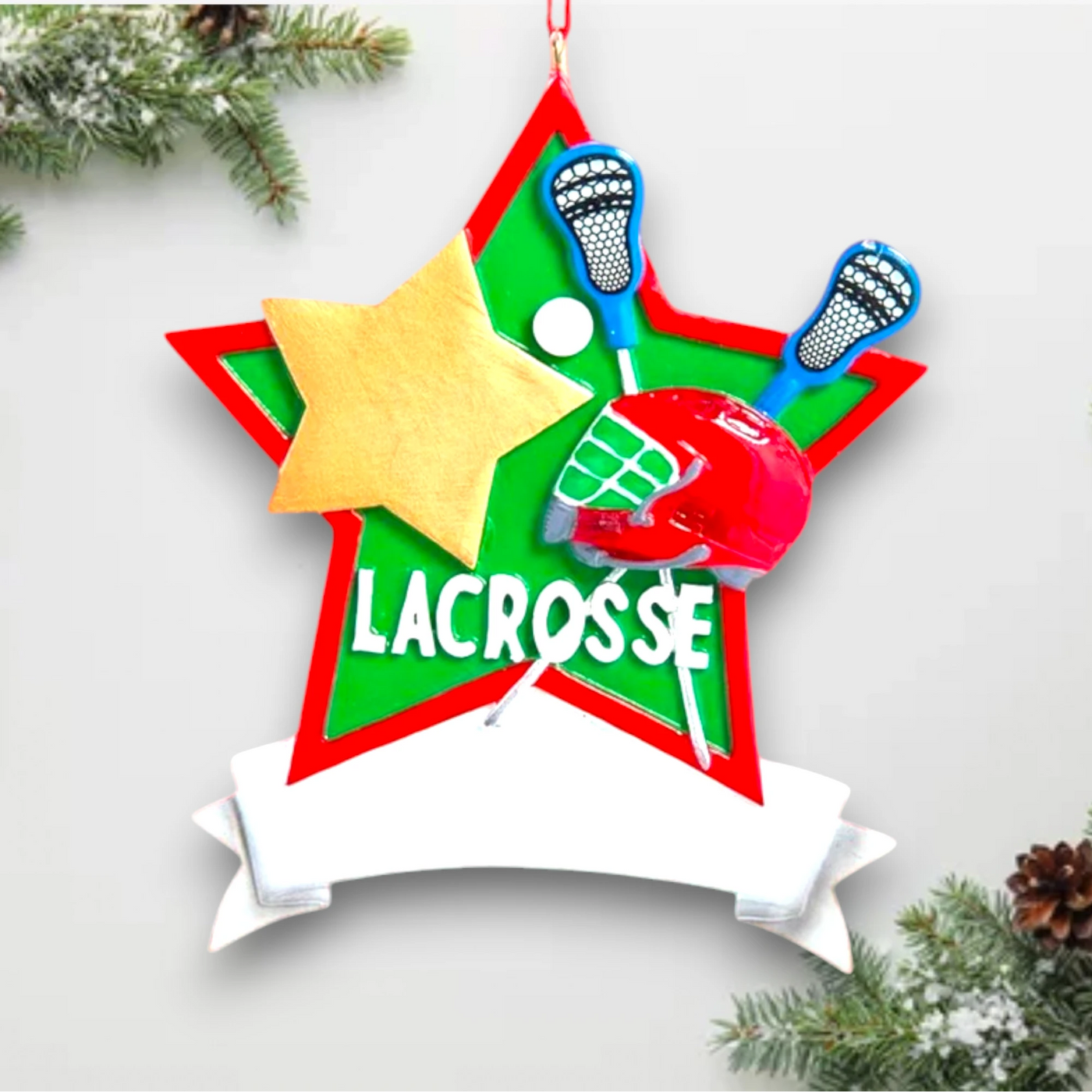 Star-shaped lacrosse Christmas ornament featuring crossed lacrosse sticks, festive colors, and a customizable banner.
