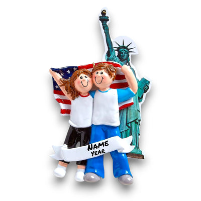 Personalized LOVE IN NEW YORK Christmas Ornament featuring a couple, the Statue of Liberty, and an American flag with customizable names and year.