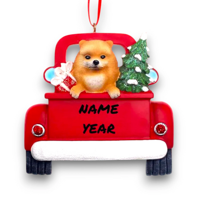 Personalized Pomeranian In Back Of Truck Christmas Ornament featuring a Pomeranian, festive Christmas tree, and holiday gifts in a red truck with customizable name and year.
