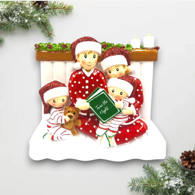  Personalized Reading In Bed Family of 4 Christmas Ornament with four family members in pajamas, holding a bedtime storybook, customizable with names and year.
