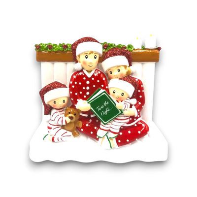  Personalized Reading In Bed Family of 4 Christmas Ornament with four family members in pajamas, holding a bedtime storybook, customizable with names and year.
