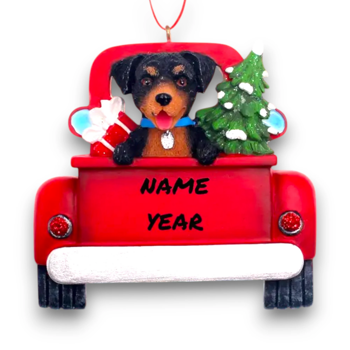 Personalized Rottweiler In Back Of Truck Christmas Ornament featuring a Rottweiler, festive red truck, Christmas tree, and gift, customizable with name and year.
