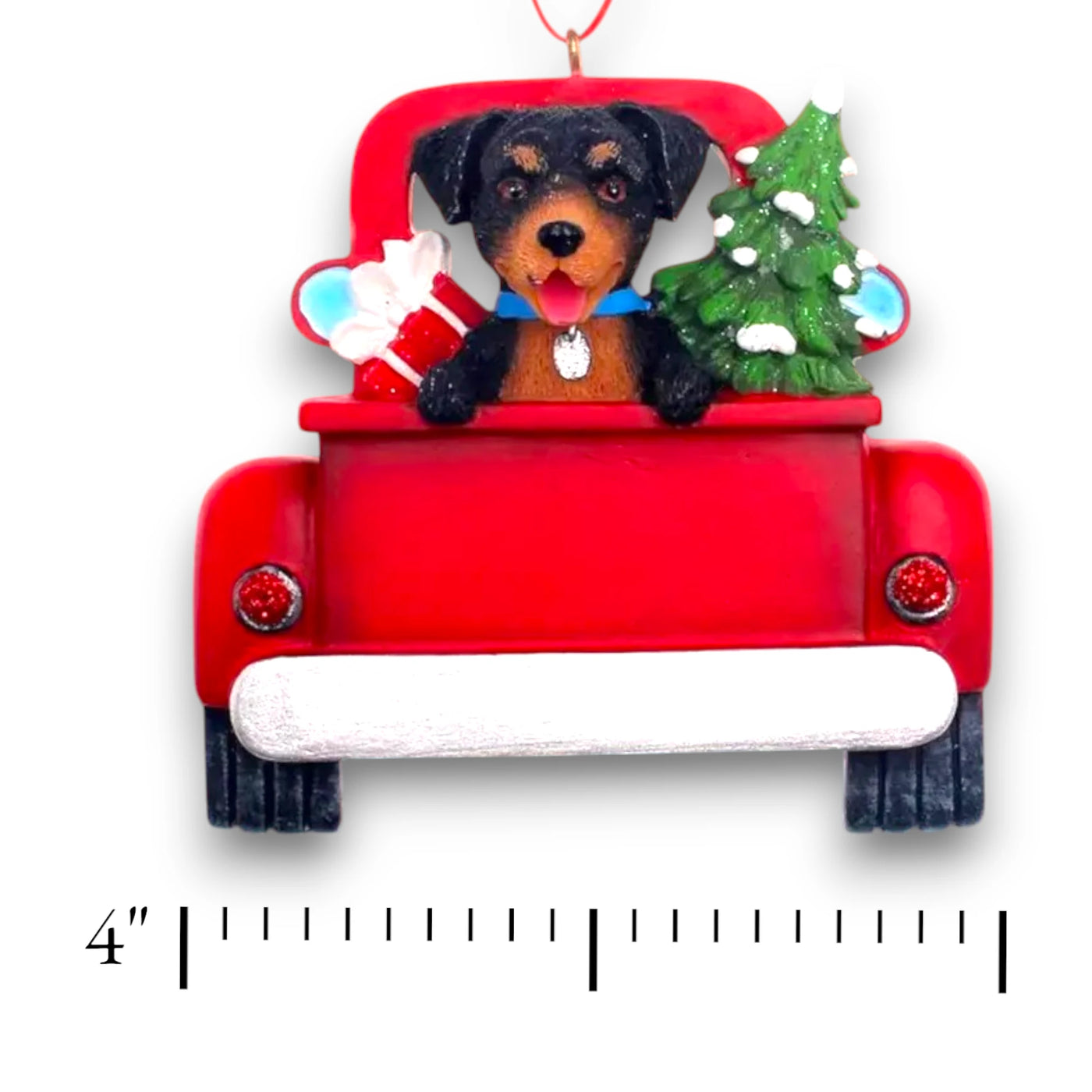 Personalized Rottweiler In Back Of Truck Christmas Ornament featuring a Rottweiler, festive red truck, Christmas tree, and gift, customizable with name and year.
