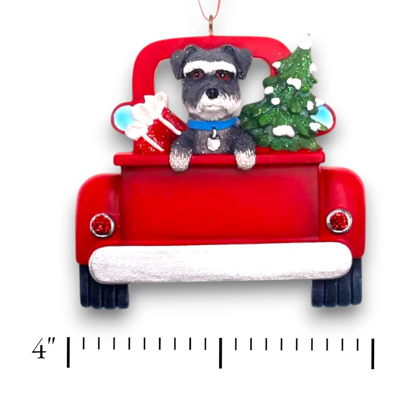 Personalized Schnauzer In Back Of Truck Christmas Ornament featuring a schnauzer, festive red truck, Christmas tree, and gift, customizable with name and year.
