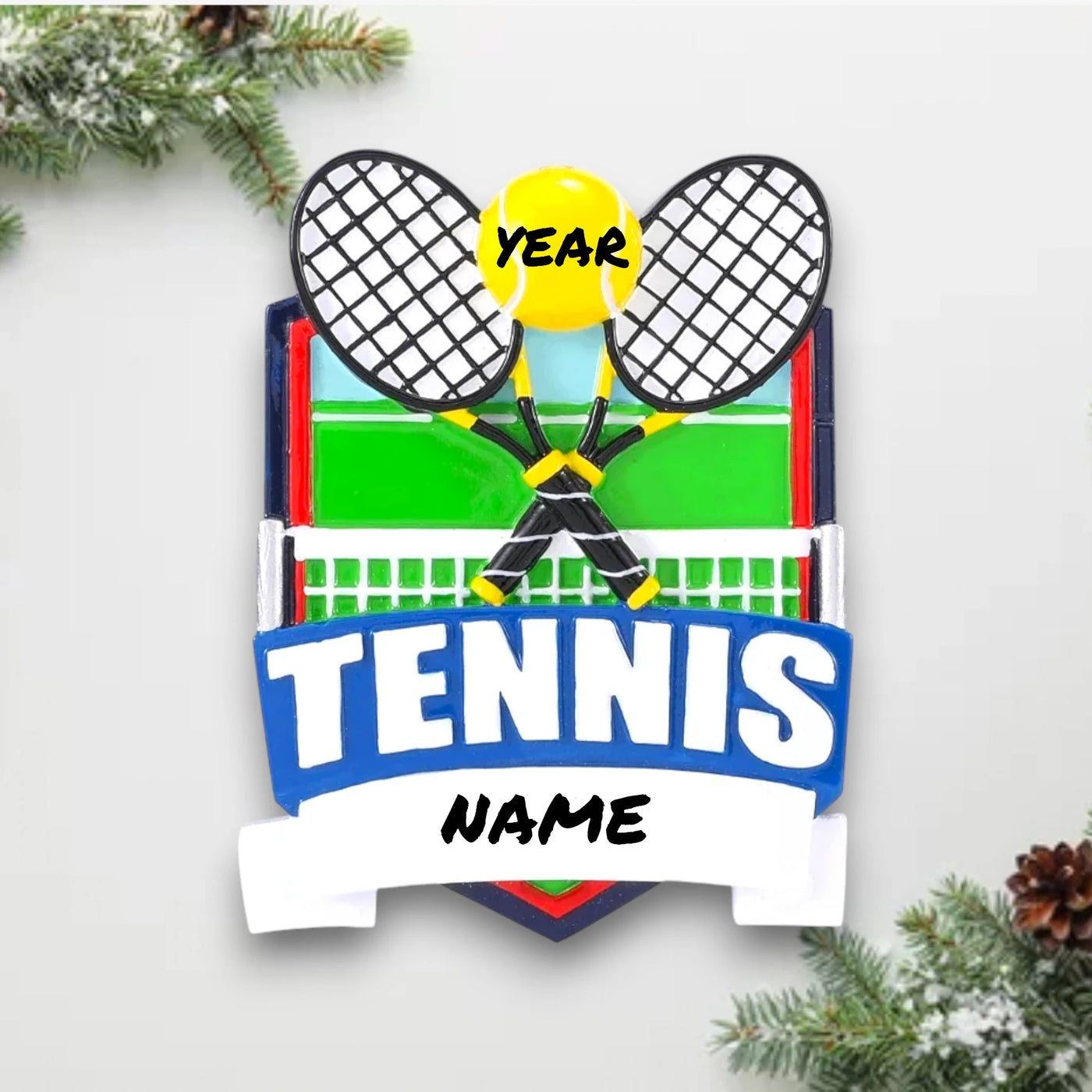 Personalized Tennis Shield Christmas Ornament with customizable name and year, featuring crossed tennis rackets, a yellow tennis ball, and a green court background.
