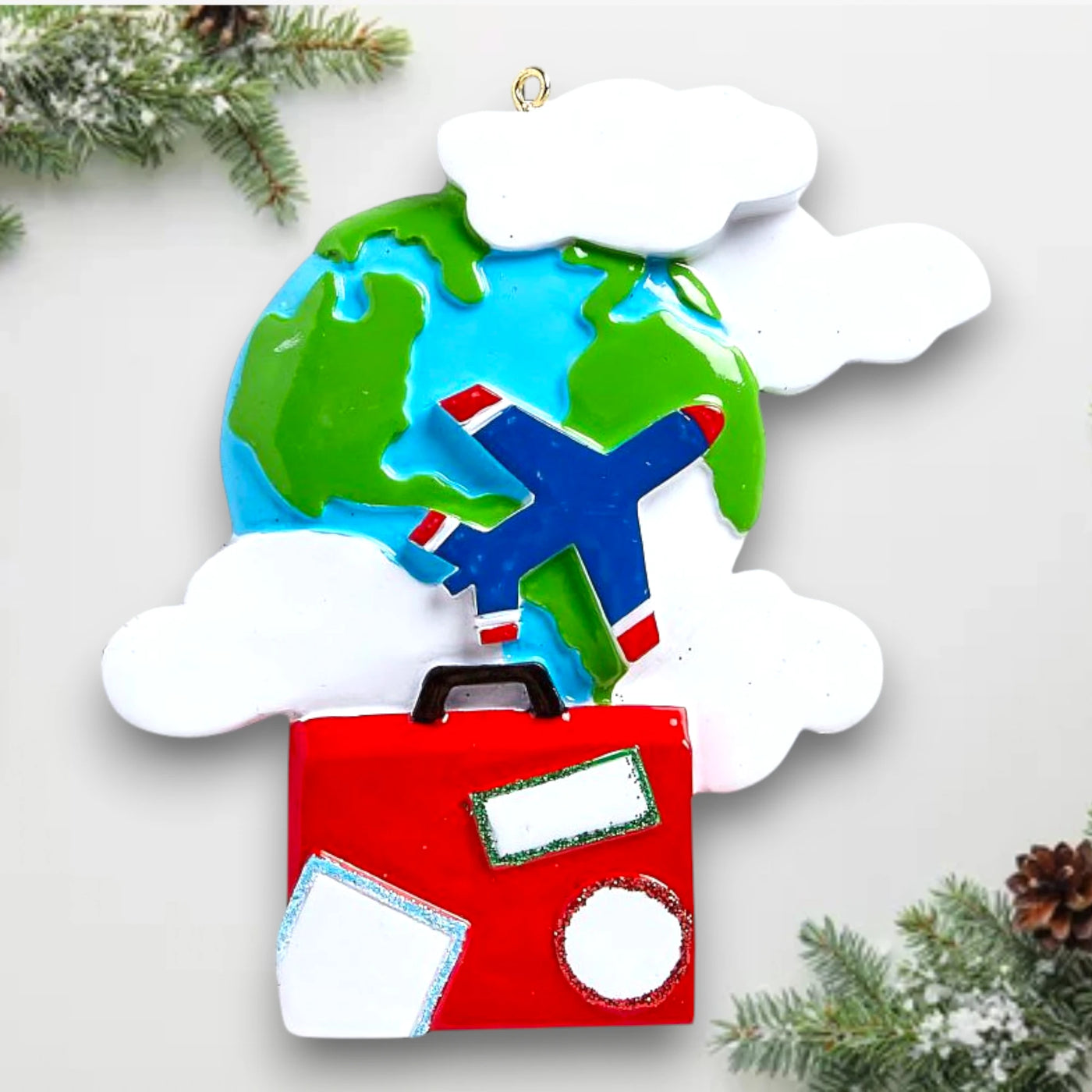 Personalized World Travelers Christmas Ornament featuring a globe, airplane, suitcase, and customizable name, year, and message.