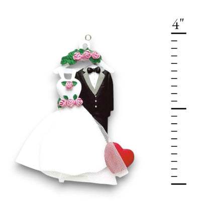 Personalized Wedding Attire Christmas Ornament featuring a wedding dress, tuxedo, and heart with customizable names and year.