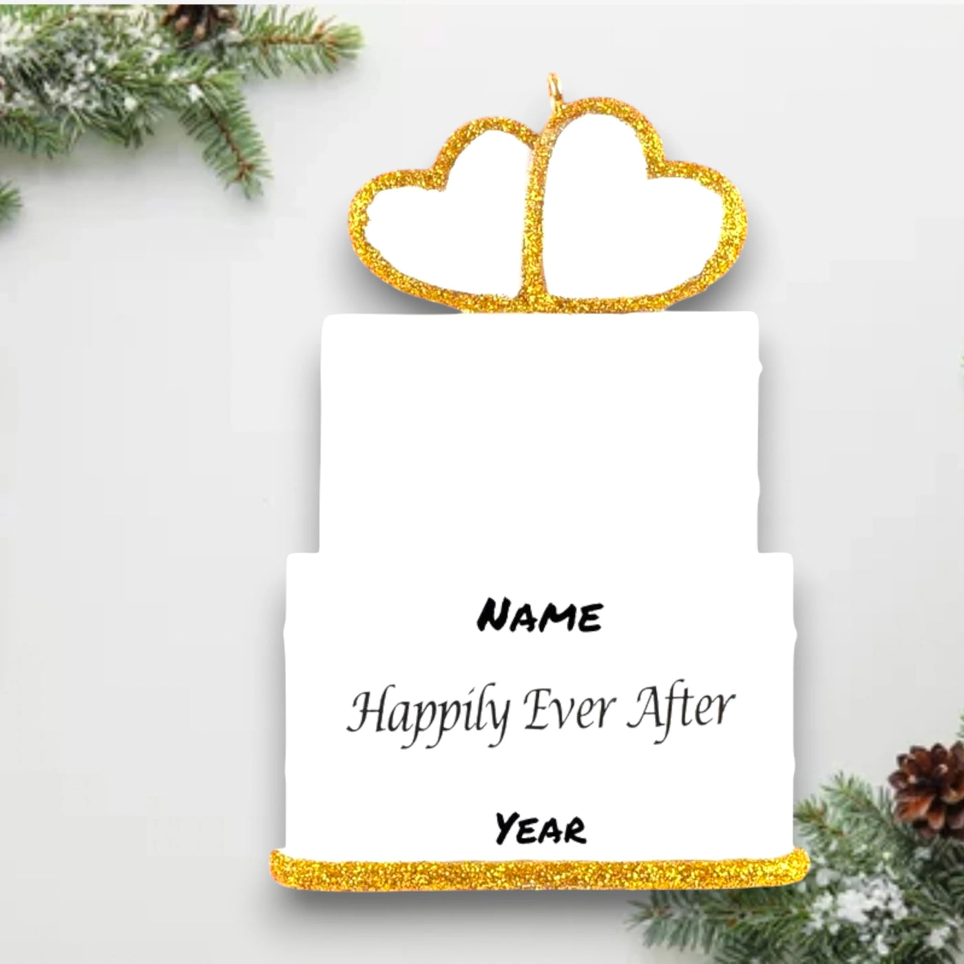 Personalized Wedding Cake Christmas Ornament featuring glittery gold hearts, a tiered cake design, and customizable names and wedding date.

