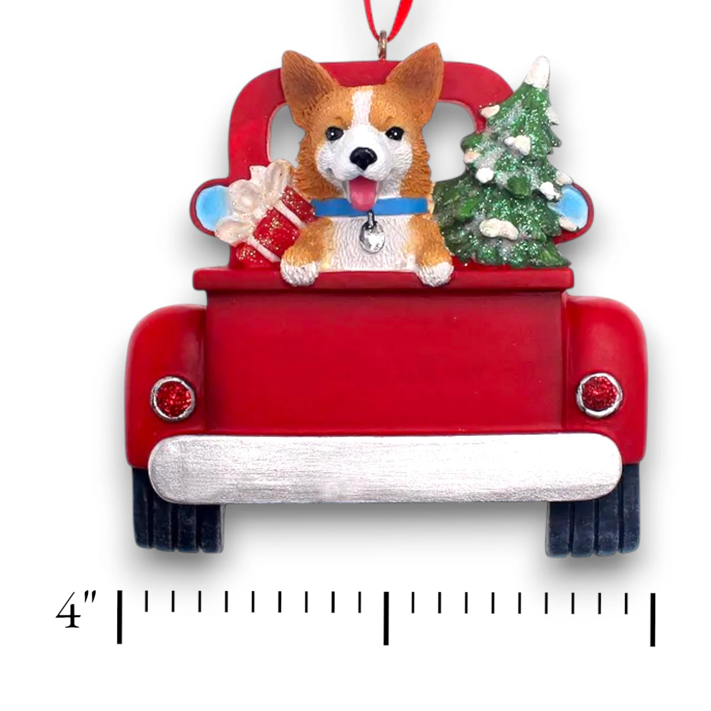 Personalized Welsh Corgi In Back Of Truck Christmas Ornament featuring a Welsh Corgi, Christmas tree, and presents in a red truck with customizable name and year.