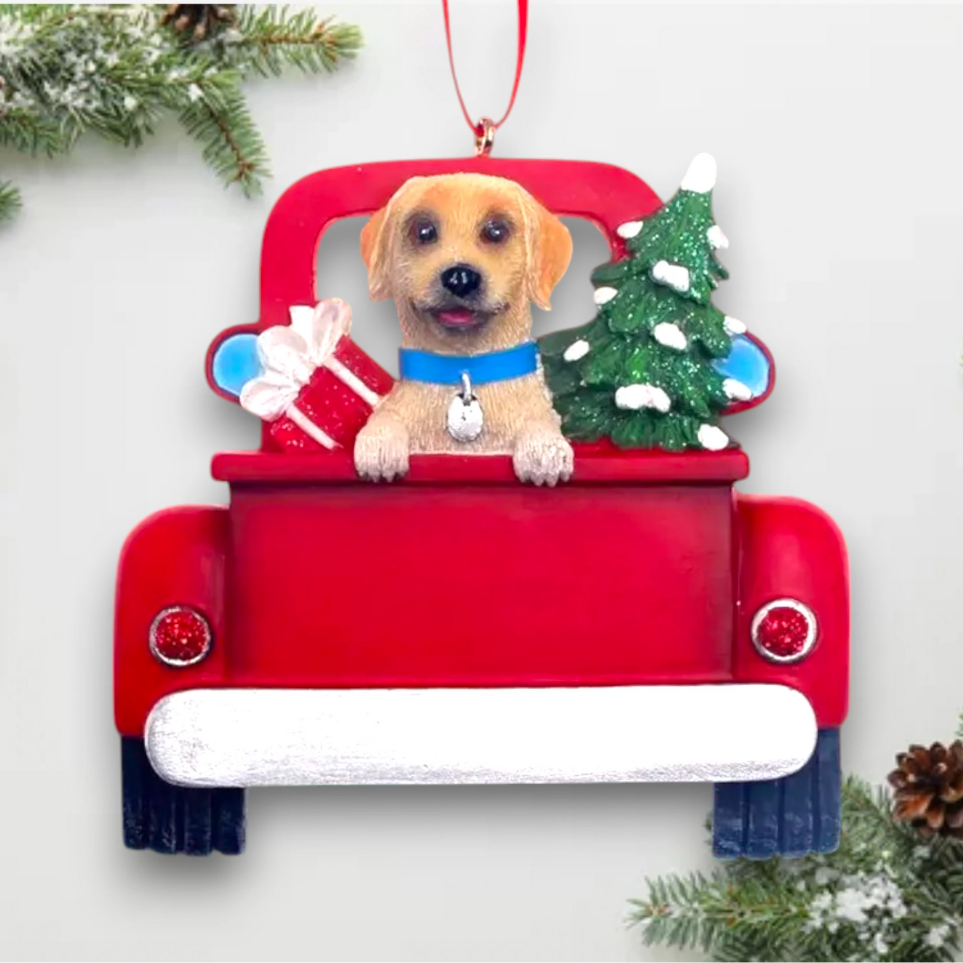 Personalized Yellow Labrador In Back Of Truck Christmas Ornament featuring a Yellow Labrador, festive Christmas tree, and holiday gifts in a red truck with customizable name and year.
