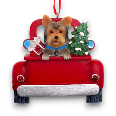 Personalized Yorkshire Terrier In Back Of Truck Christmas Ornament featuring a Yorkshire Terrier, festive Christmas tree, and holiday gifts in a red truck with customizable name and year.