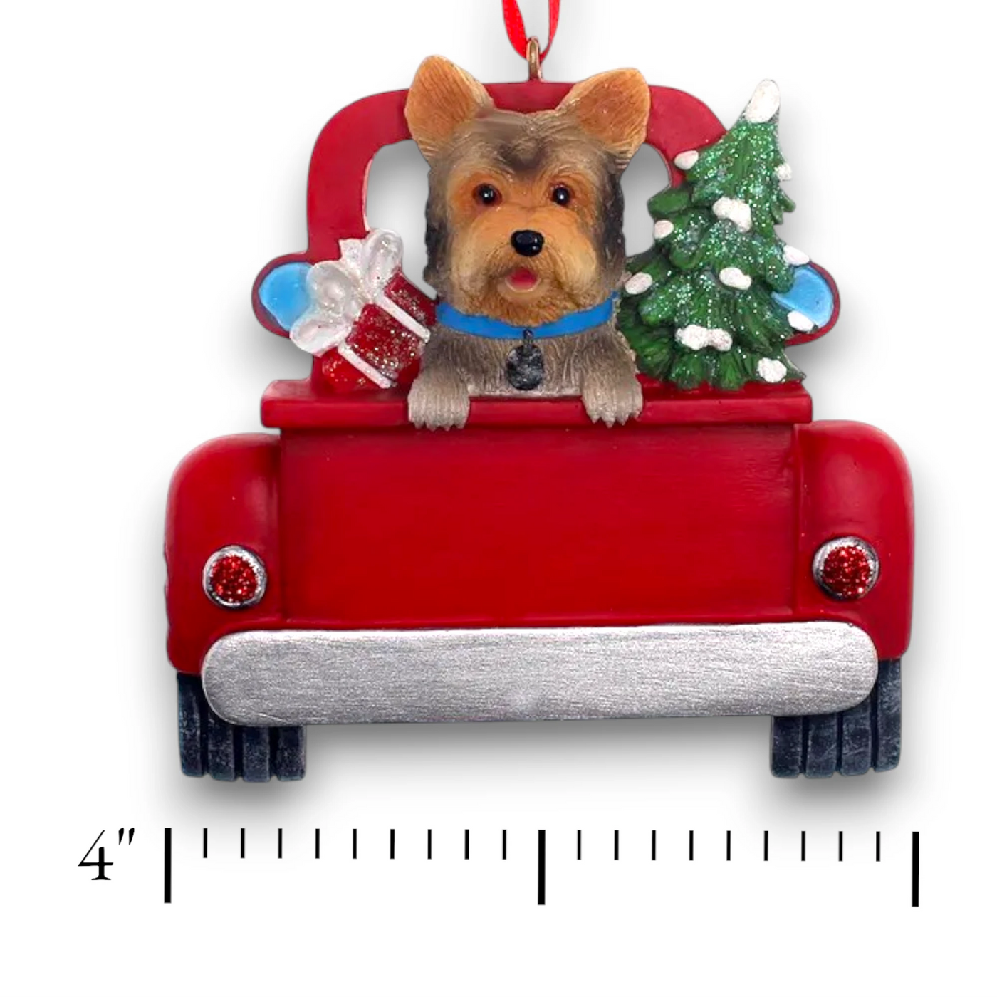 Personalized Yorkshire Terrier In Back Of Truck Christmas Ornament featuring a Yorkshire Terrier, festive Christmas tree, and holiday gifts in a red truck with customizable name and year.