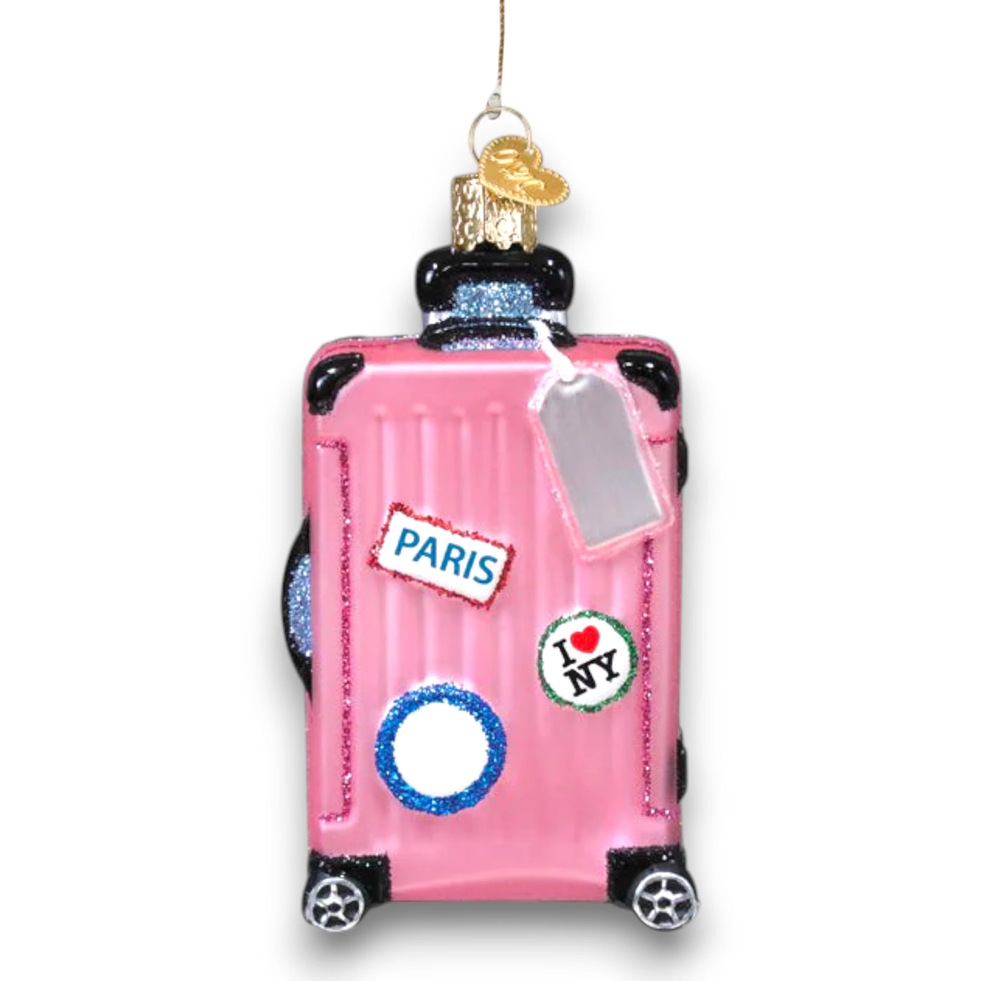 Personalized Pink Rolling Suitcase Christmas Ornament featuring a pink suitcase with travel stickers, glitter details, and a silver luggage tag, customizable with a name or year.