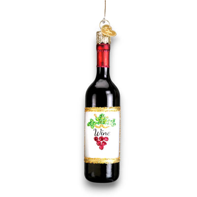 Red wine bottle Christmas ornament featuring a glossy finish, glitter-accented label with grape details, and a festive gold trim.