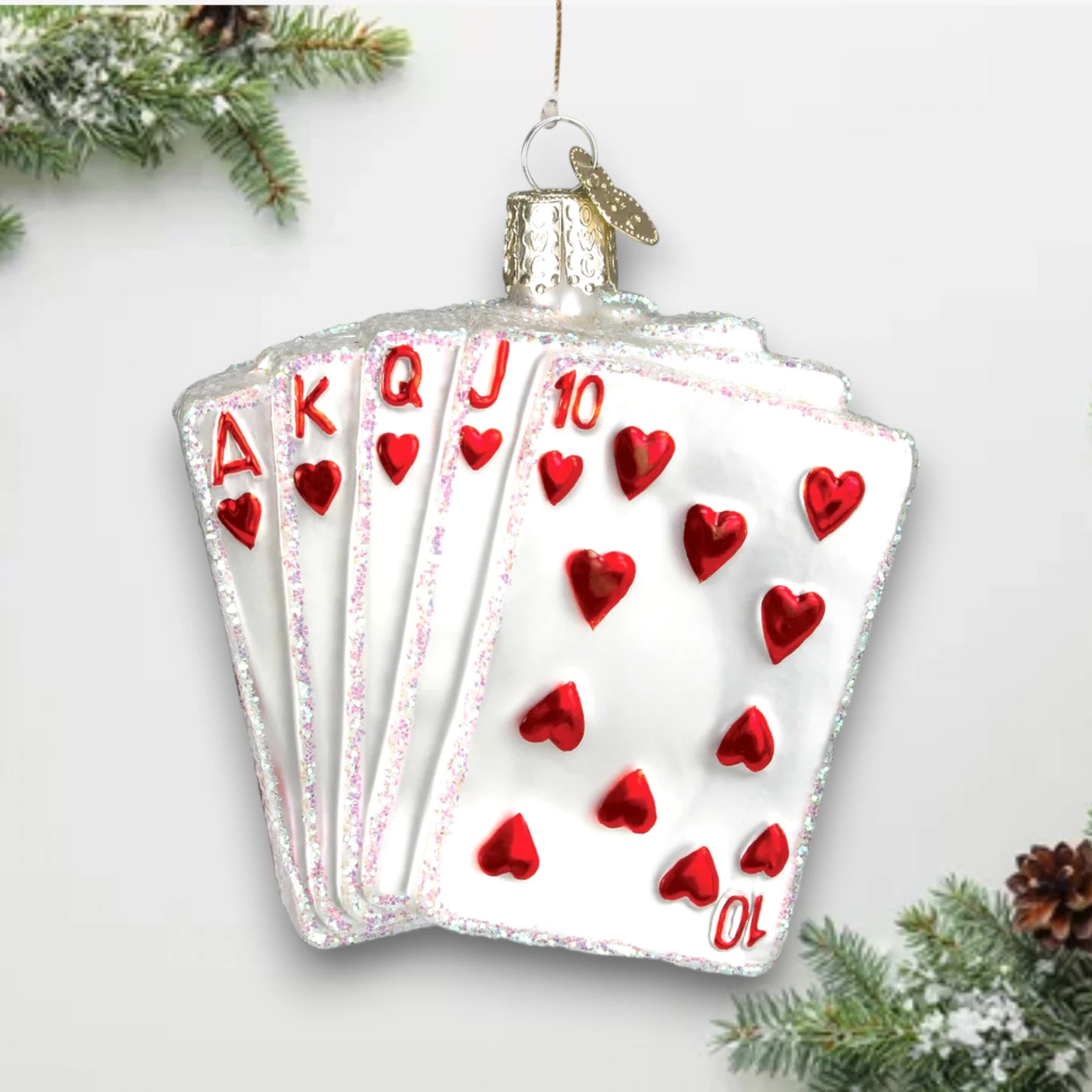 Royal Flush Christmas ornament featuring Ace, King, Queen, Jack, and Ten of Hearts with glitter details, customizable with name and year.