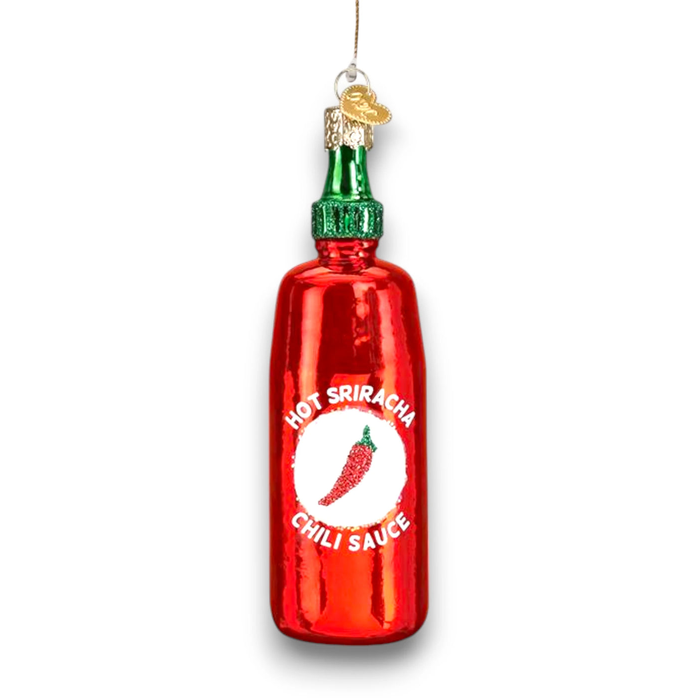 Sriracha Sauce Christmas ornament featuring a bright red bottle with a green cap, glitter accents, and iconic chili pepper label.