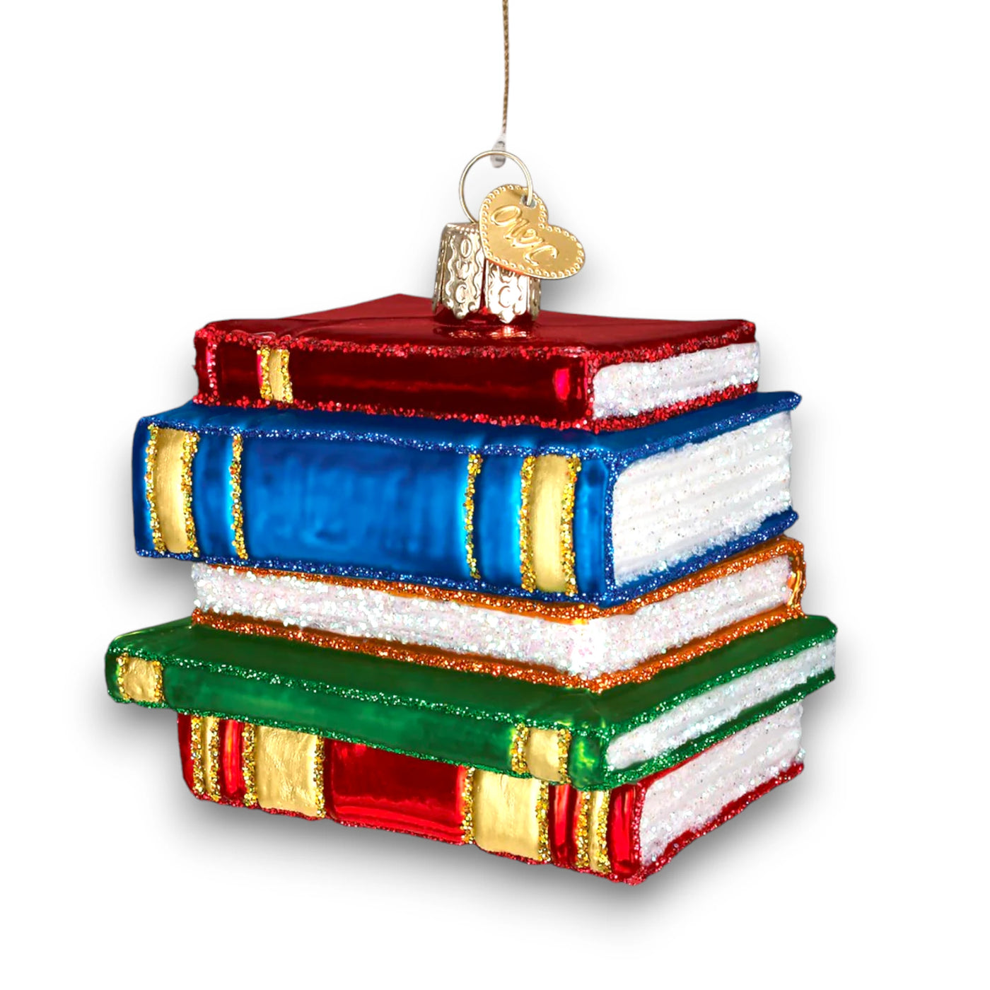 Christmas ornament featuring a stack of books in red, blue, and green with sparkling glitter accents, ideal for book lovers and teachers.