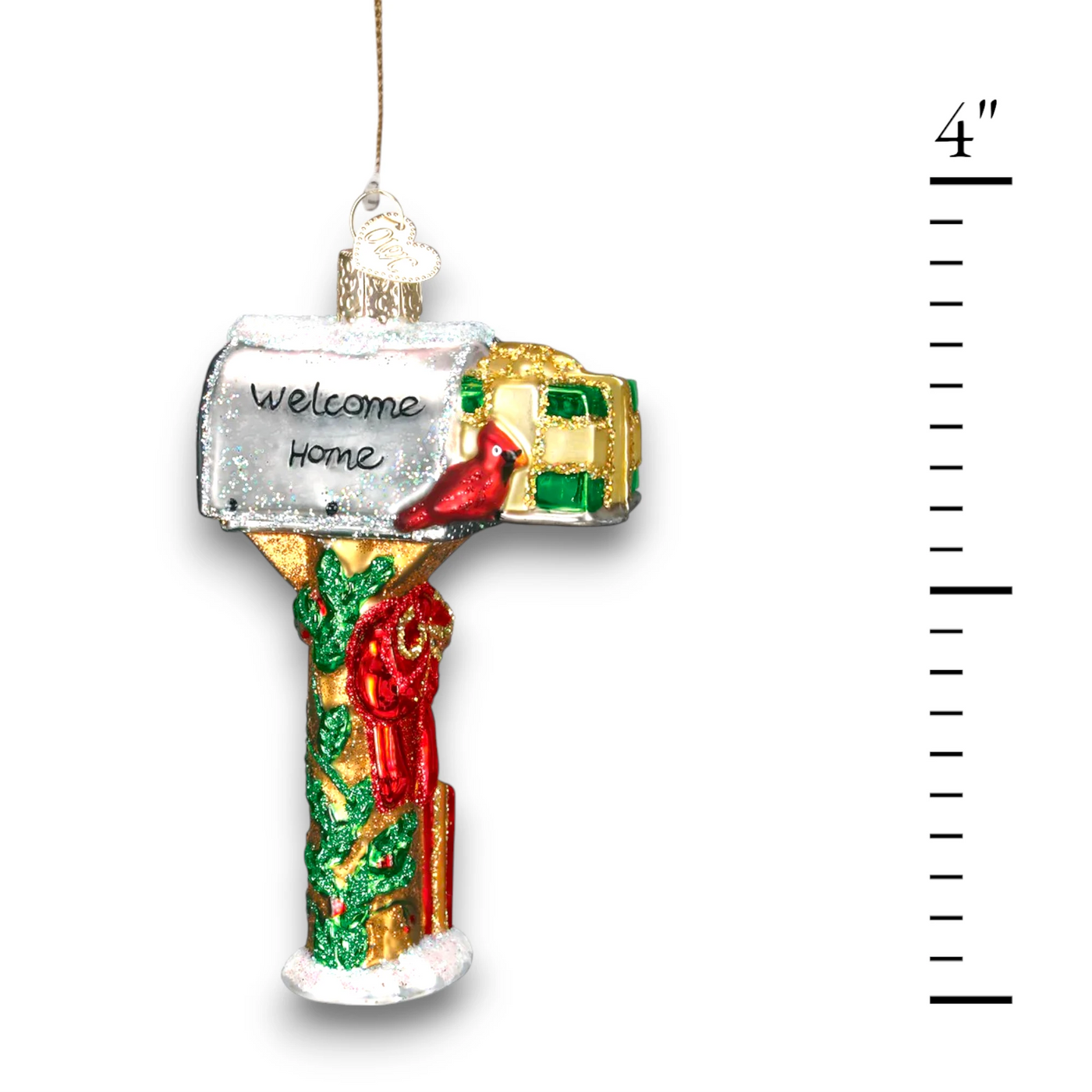 Festive mailbox Christmas ornament featuring a “Welcome Home” message, red cardinal, and holly decorations, accented with glitter details.